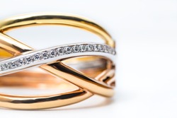 part of modern design gold bangle with diamond on white background