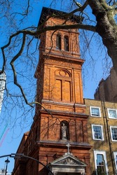 A view of St. Patricks Roman Catholic Church in the historic Soho Square in London, UK.