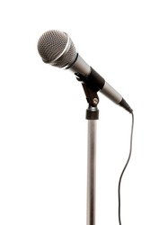 Chrome microphone seen from an angle isolated on a white background