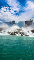 Beautiful Niagara Falls on a clear sunny day. Niagara, Canada. bottom to top view of falling water