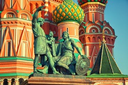 Statue of Minin and Pozharsky on the background of St. Basil's Cathedral in Moscow on Red Square