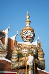 Massive giant Demon Guardian  at the Eastern Gate of The Temple of Dawn, Bangkok, Thailand