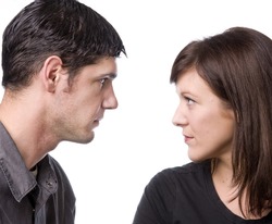 Attractive couple facing each other in profile