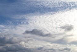 Sky with windy weather clouds scatered by harsh wind. Windy weather concept. Climate change background