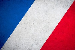 French flag tricolour street art background on textured grunge concrete wall
