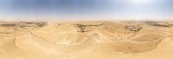 360 degrees panoramiic view from the sky to Negev Desert with a farm and small lake
