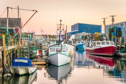 Fishing Harbour with Colourful Boats at Sunset 