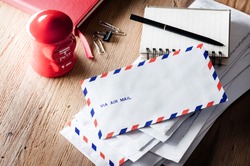 air mail envelope on the wood table