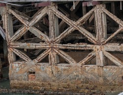 Reinforced concrete have cracked and rusty in steel structure in caused by salt in the sea, Danger area should be recomment by construction engineer