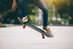 Skateboarder skateboarding  on parking lot