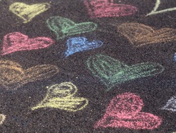 Chalk drawings on asphalt