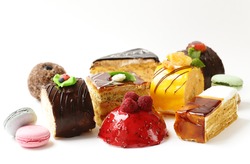 Assorted mini cakes sweet dessert, chocolate and fruit