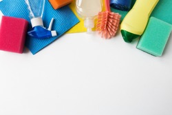 housework, housekeeping and household concept - cleaning stuff on white background