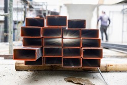Galvanized rectangular steel tube in construction site.