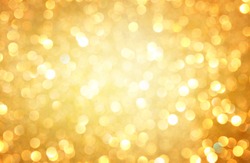 gold abstract background with bokeh defocused lights