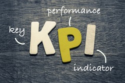 KPI (key performance indicator) on wood background