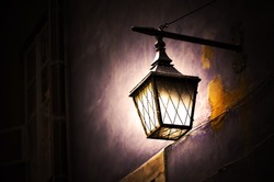 Retro street lamp shining at night