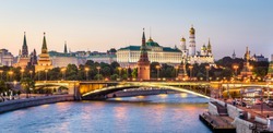 Moscow Kremlin at Moskva River, Russia. Beautiful view of Moscow city center in summer. Panorama of old famous Moscow landmark at sunset. Moscow cityscape at dusk. Travel and sightseeing in Russia.