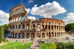 Colosseum in Rome, Italy. Ancient Roman Colosseum is one of main tourist attractions in Europe. People visit the famous Colosseum in Roma city center. Scenic nice view of Colosseum ruins in summer.