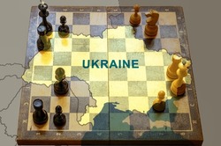 War in Ukraine, chess like geopolitics game between Russia, EU and USA. Ukraine map on chessboard. Concept of political tension, war, crisis, conflict, sanctions, talks, meeting and strategy.