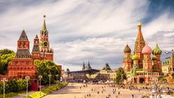 Moscow Kremlin and of St Basil's Cathedral on Red Square, Moscow, Russia. Ancient Moscow Kremlin is the main tourist attraction of city. Beautiful panoramic view of the heart of Moscow on sunny day.