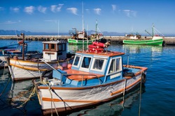 Old harbor with fishing boats in Kalk Bay, South Africa
