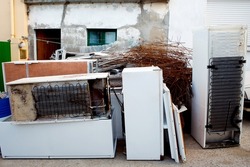 Dump the old broken appliances. Throwing out obsolete appliances 