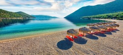 Panoramic morning view of Antisamos Beach. Bright spring seascape of Ionian Sea. Splendid outdoor scene of Kefalonia island, Sami town location, Greece, Europe. Traveling concept background.
