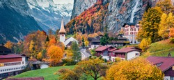 Panoramic autumn view of Lauterbrunnen village. Colorful evening scene in Swiss Alps, Bernese Oberland in the canton of Bern, Switzerland. Traveling concept background.