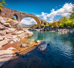 Spectacular spring view of Old Mes Bridge. Majestic morning landscape of Shkoder. Breathtaking outdoor scene of Albania, Europe. Traveling concept background.
