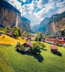 Captivating summer view of waterfall in Lauterbrunnen village. Gorgeous outdoor scene in Swiss Alps, Bernese Oberland in the canton of Bern, Switzerland, Europe. Traveling concept background.