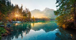 Amazing autumn sunrise of Hintersee lake. Picturesque morning view of Bavarian Alps on the Austrian border, Germany, Europe. Beauty of nature concept background.