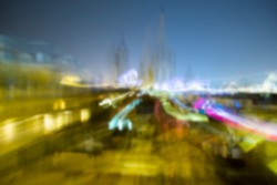 Blurred background of night Barcelona city lights, top view.