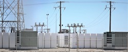 Battery storage at a Solar Farm with switchgear or switch gear in the background
