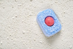 Dishwasher detergent tablet and powder. Choice concept. Copy space
