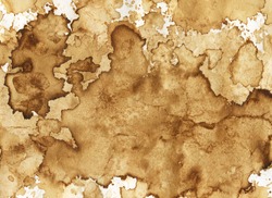 Brown coffee stains on paper. Abstract background or texture