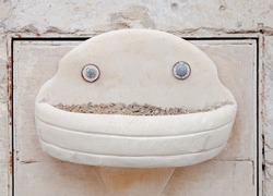 Some people will see a funny smiling face in what it's a stone fountain or a cigarette container. This phenomenon is called pareidolia.
