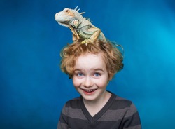 
boy and iguana, 
child and his best friend wild animal, boy and dragon