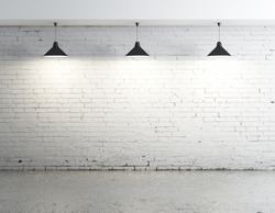brick concrete room with three ceiling lamps