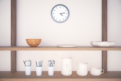 Kitchen shelves with cutlery and dinnerware on concrete wall and a clock above. 3D Render
