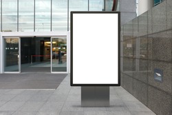 Blank street billboard poster stand mock upnear entace of shopping center in  downtown. 3d illustration.