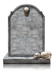 Tombstone with skull isolated on white background, copy space and clipping path.