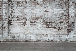Urban background, white ruined industrial brick wall with copy space