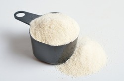 Guar gum, also called guaran, is a galactomannan polysaccharide extracted from guar beans. On white background