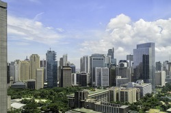 Mix of old and modern urban buildings in Makati City, Manila, Philippines