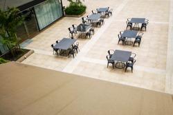 Restaurant tables and chairs in the courtyard