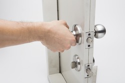 Door knobs, aluminum door white background.