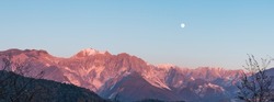 Panoramic view of the Carrara's side of the Apuan Alps with marble quarries; the Apuan Alps (Alpi Apuane in Italian) are a mountain range in northern Tuscany in Italy, known for its Carrara Marble