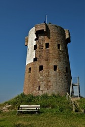 An external view of a German World War Two military observation tower at Le Hocq on the scenic coast of Jersey in the Channel Islands. 