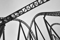 Abstract silhouette view of roller coaster track construction background. No people. Copy space